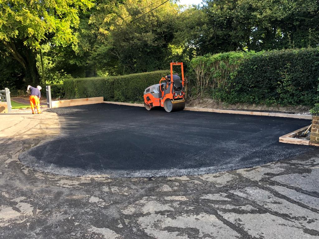 This is a photo of a bitumen driveway which is in the process of being installed by Singleton Road Tek